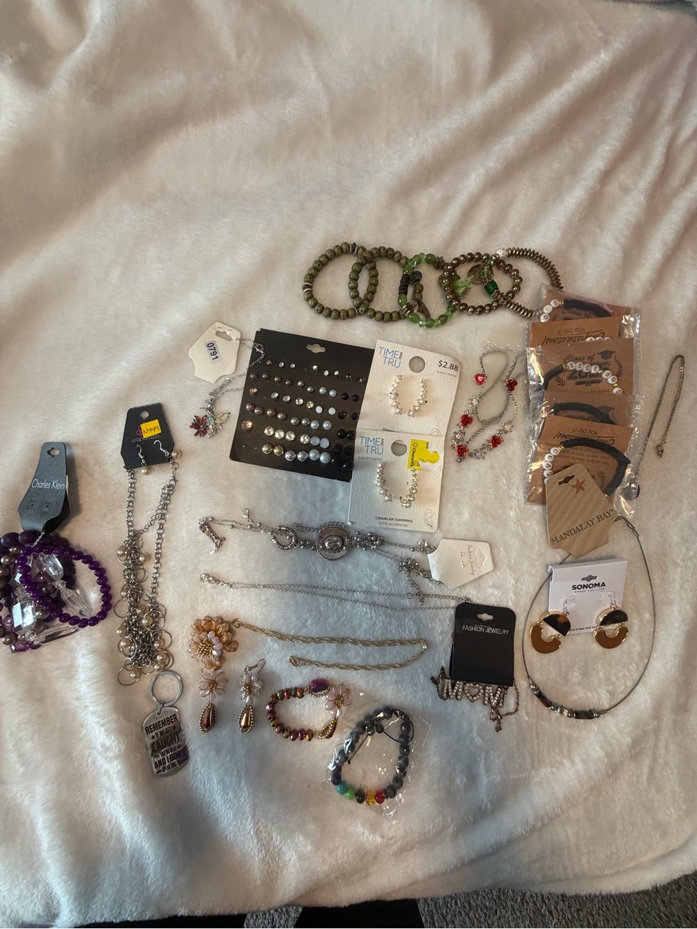 28 piece jewelry bundle includes Coach Purple Round Logo Pendant Necklace